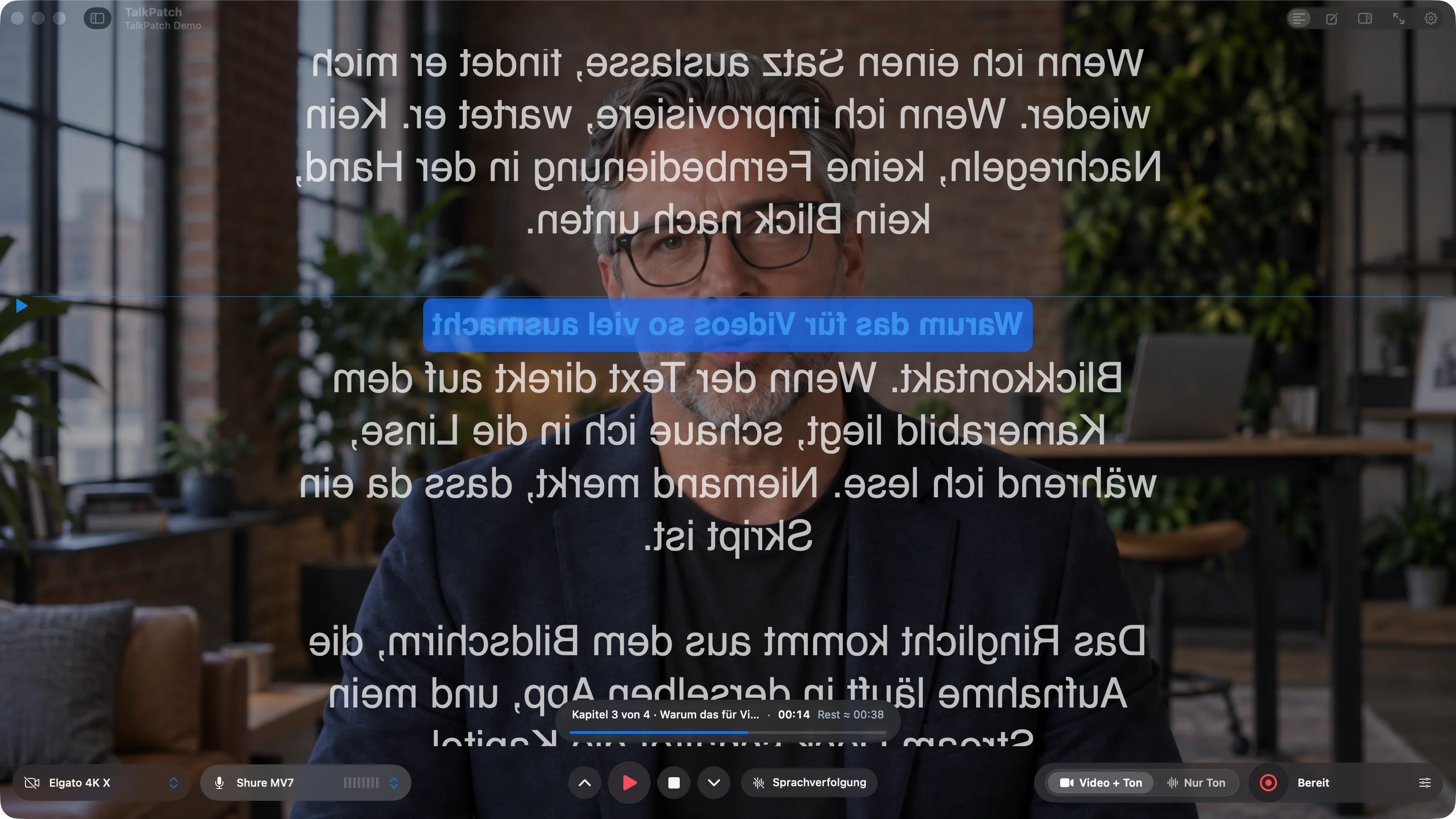 Horizontal gespiegelter Lauftext über dem Kamerabild, wie ihn ein Teleprompter-Spiegel vor der Linse braucht